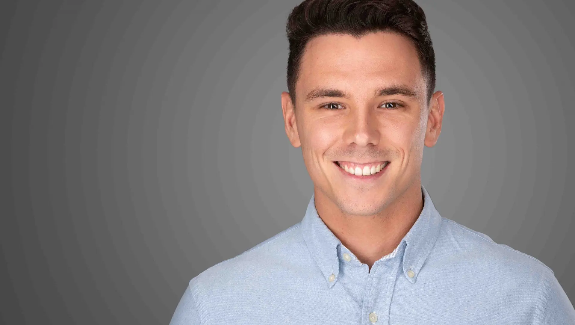 Professional headshot Sydney, man in light blue shirt